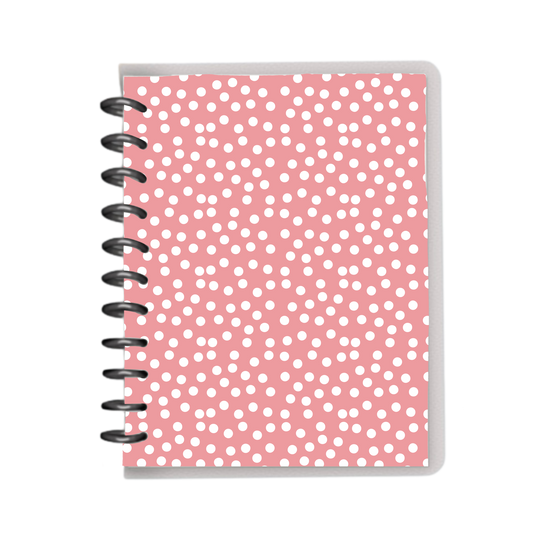 Pink and white polka dotted notebook